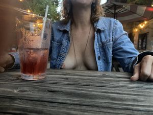 Wife flashing her tits at a local bar