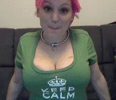 Pink hair babe motorboats her own cleavage