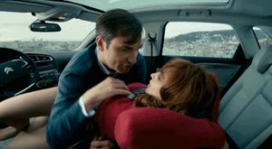 Redhead gets cleavage motorboat in frontseat