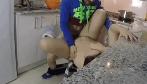 Neighbor helps wife stir in the ingredients