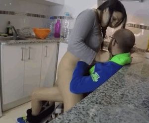 Wife showing neighbor how to purée like a blender