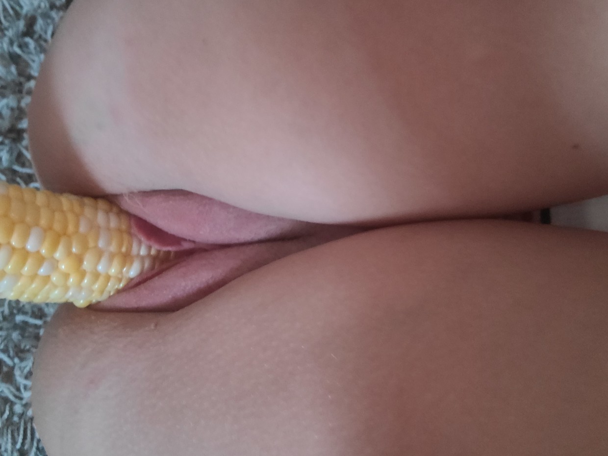 Buttering my corn for that perfect flavor!