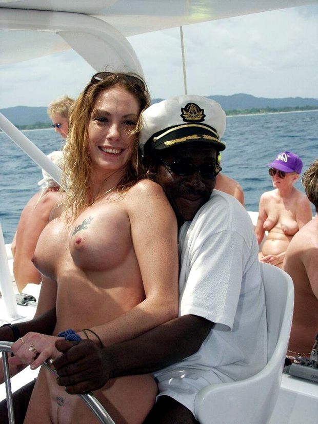 This captain is letting one of the married whores drive his boat!