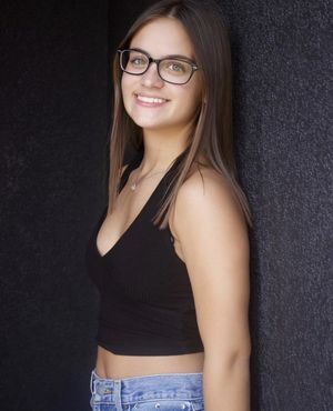glasses teen posing
