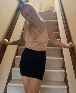 teen posing in slutty top and skirt