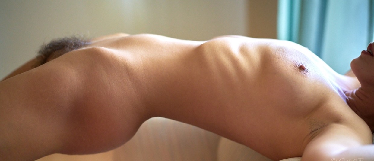Arching her back for a better view