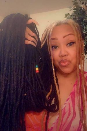 How long are they, the locs, that is?
