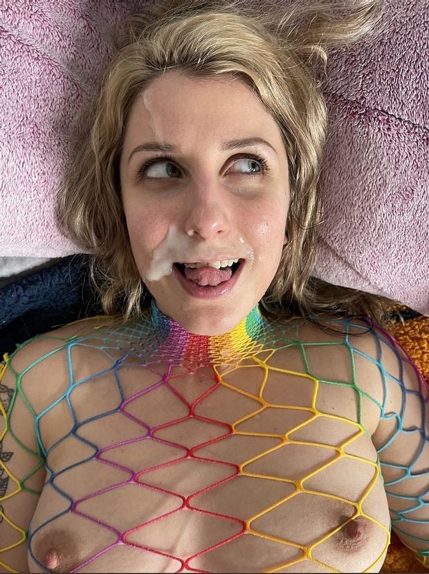 Quirky slut covered in cum.