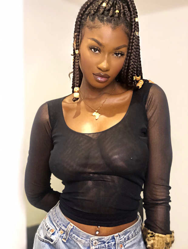Elinda San in a see-through shirt