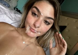Cum-splattered brunette selfie