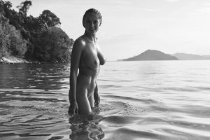 Genevieve naked in the water