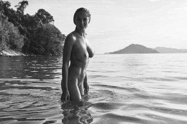 Genevieve naked in the water