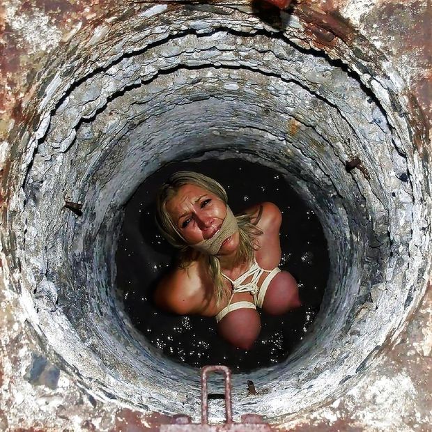 This bitch is being punished, I don't blame her for being scared, there's huge rats in that hole!