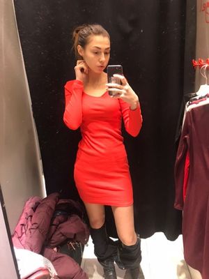 teen mirror selfie trying on dress pants down