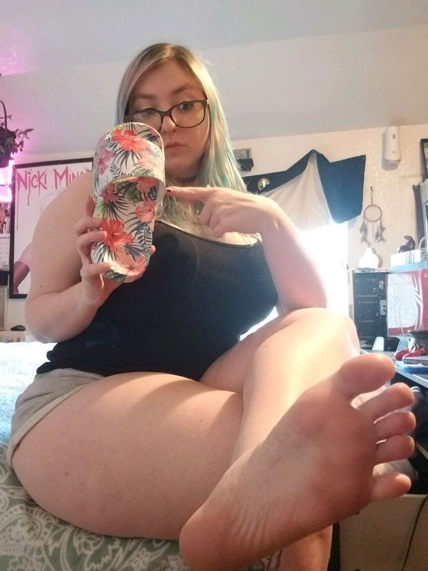 Cute Chubby with glasses shows feet and sandal