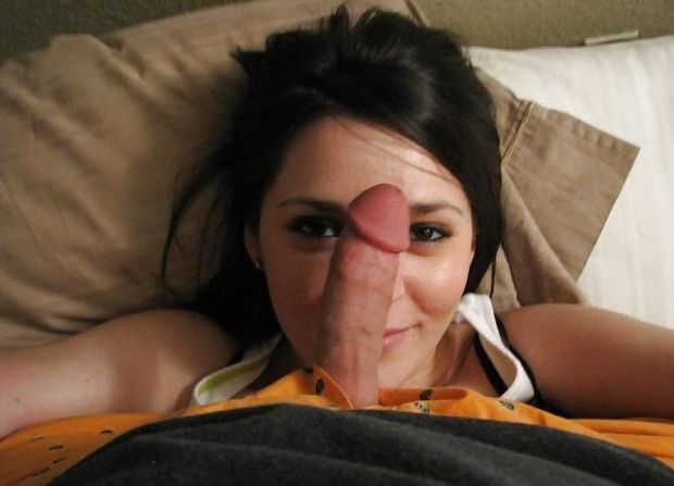 Delivery service of cock for a smiling brunette