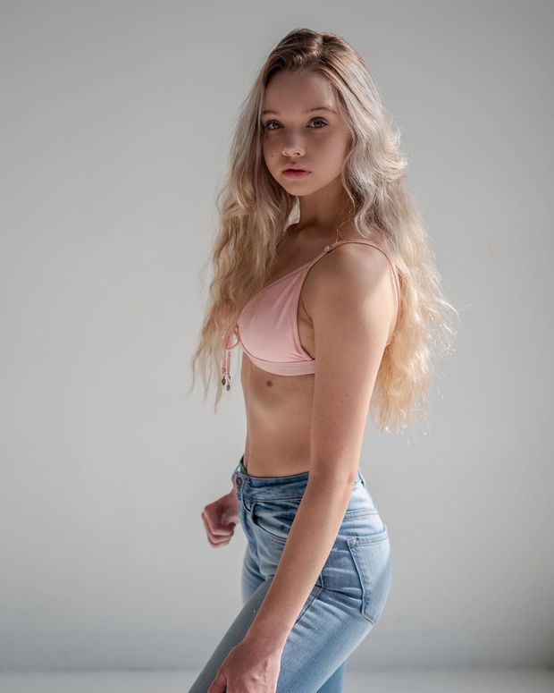 Sexy teen about to strip