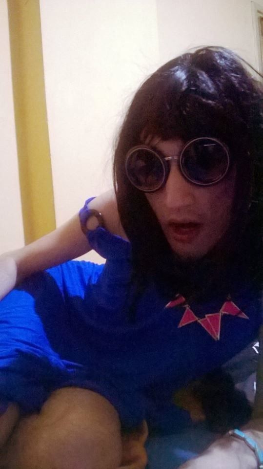 Crosdresser in blue dress with sunglasses