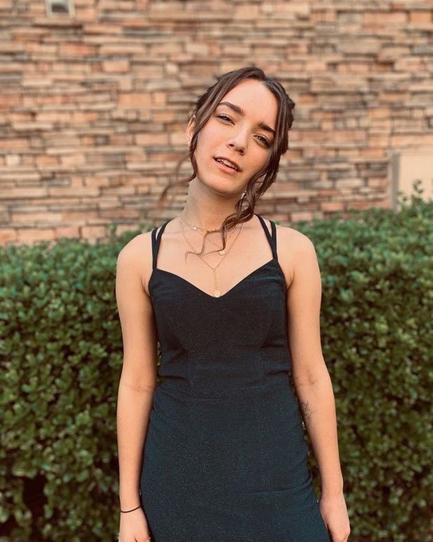 want to cover this slut's black dress in cum