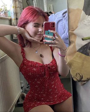 slutty mirror selfie in red skirt