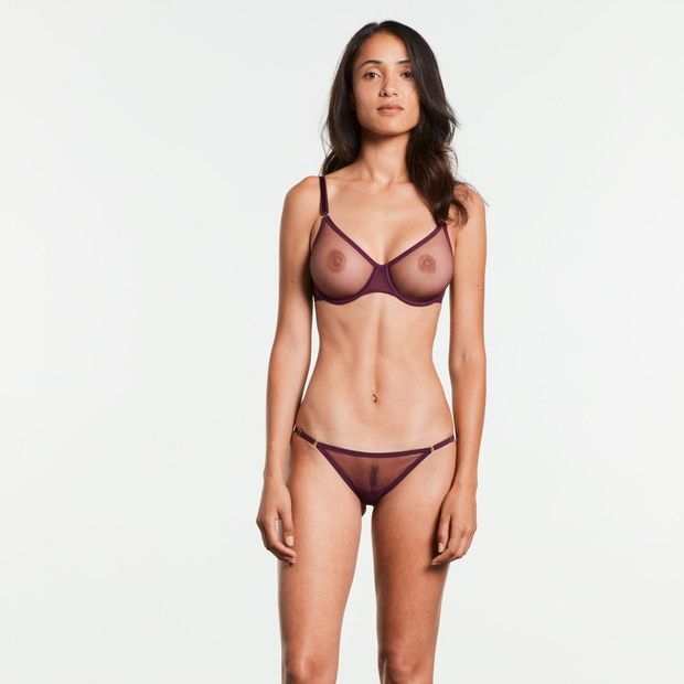 See through underwear model with dark nipples and a trimmed pussy