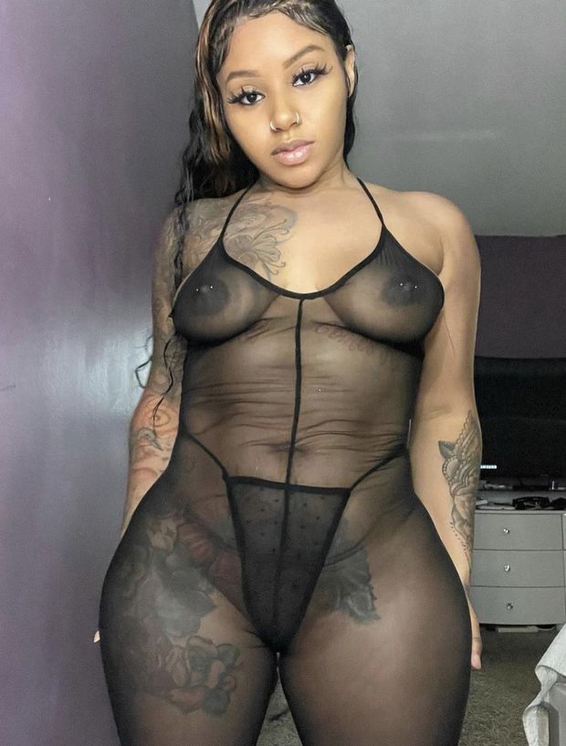 Sexy ebony in see through outfit