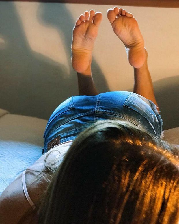 Cute feet in the pose