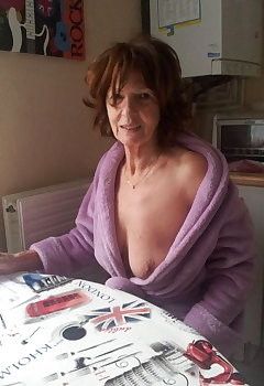 Mom was very hung over , never told her that her nipple was out