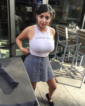 Tiny slut with huge boobs