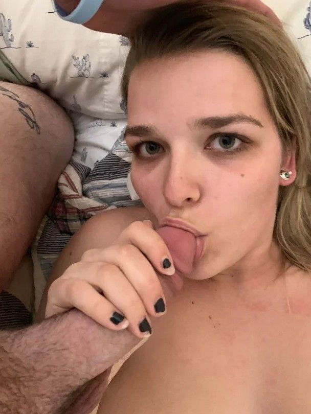 Green eyed brunette sucking a big dick