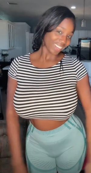 Ellie Mae huge boobs striped shirt smile