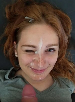 Adorable redhead facial squint