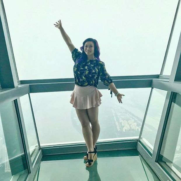 Stunning brunette on elevator