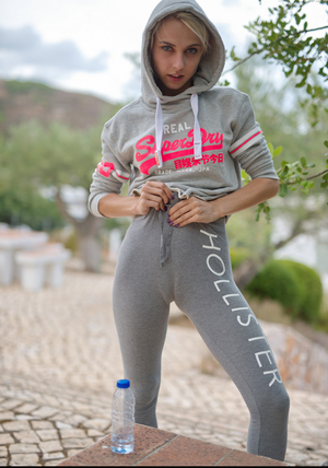 Fit blonde giving herself a front wedgie