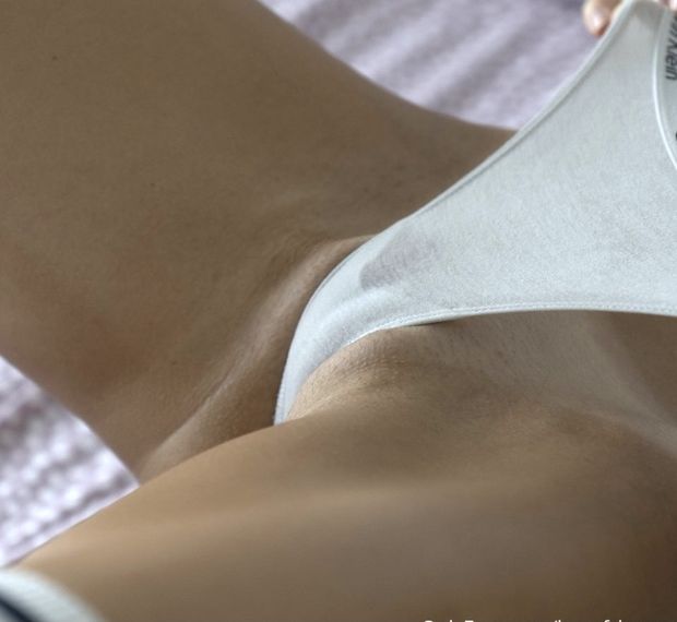 Yoga in bed with Noasana wearing CK thong