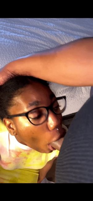 Ebony nerd sucking dick