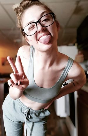 teen peace sign selfie