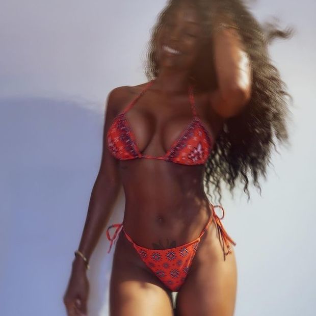LaNisha Cole showing off her beautiful smile in a bikini