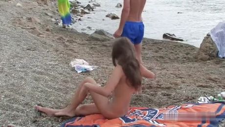 Art body painting of teengirls on seaside 01