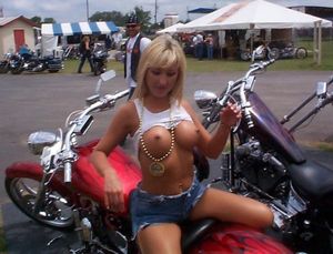 Blonde biker babe flashing tits in public