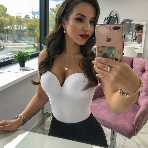 Busty brunette looking crazy hot!