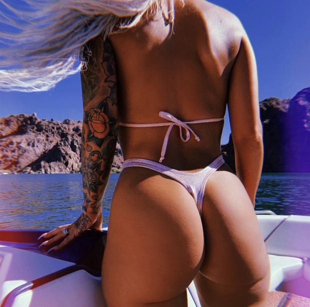 Gorgeous ass on the lake in a tight thong