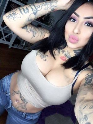 Sexy brunette with amazing tits