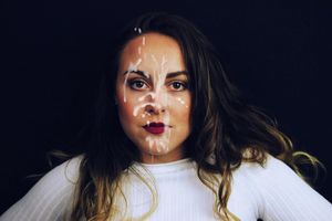 Beauty with fake cum on face