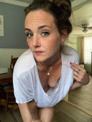 Freckles and tiny tits. What's not to like?! ;-)