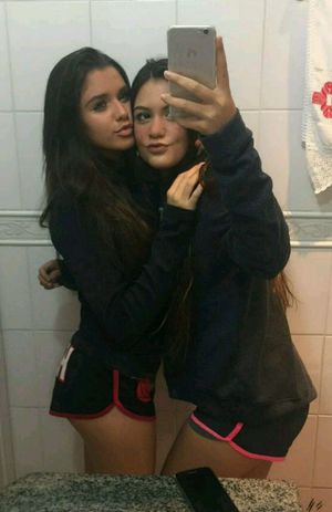 teen whores taking slutty selfies in the bathroom