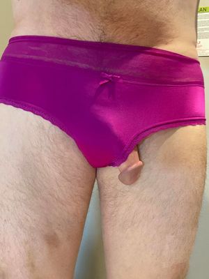 Hanging out of purple panties