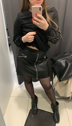 Sexy blonde in black pantyhose