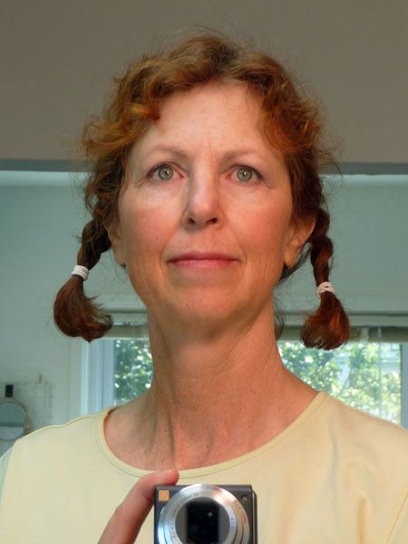 Beautiful mature with pigtail braids