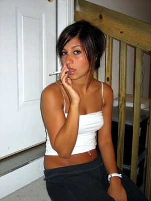 Raven Riley teasing the camera while smoking a cigarette, her dad loves taking pictures of her!